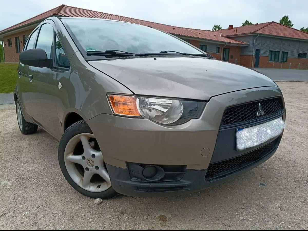 Gebraucht Mitsubishi Colt 75 PS (55 kW) 2009 Braun Kleinwagen