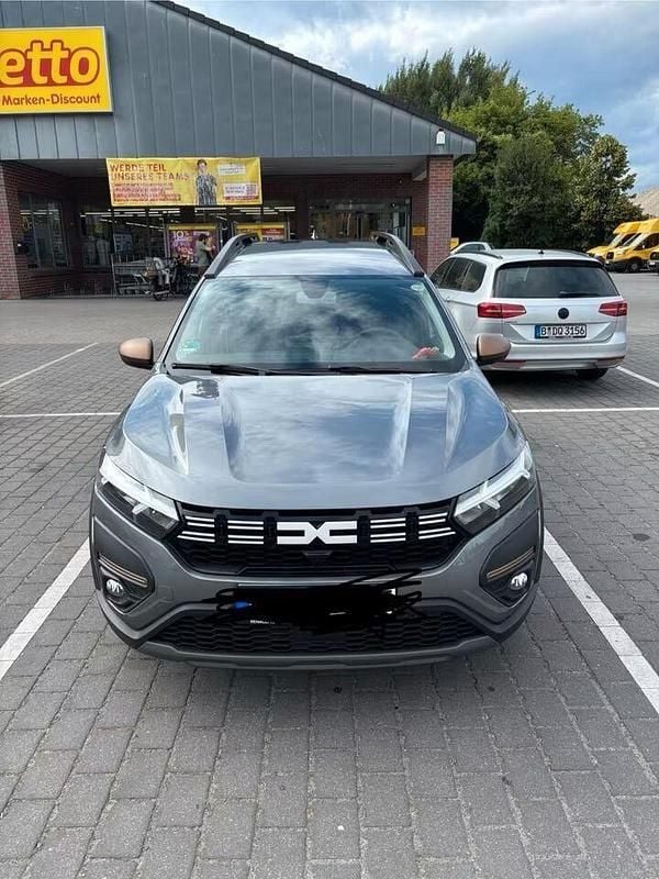 Grau Gebraucht 2024 Dacia Jogger Extreme Kombi | 15.200 € (Superpreis) - Bild 1/4
