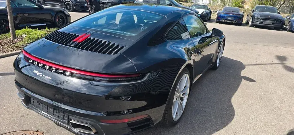 Gebraucht Porsche 911 385 PS (283 kW) 2024 Schwarz