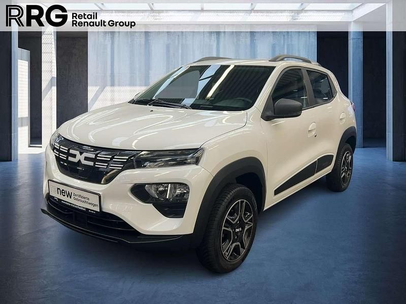 Kaolinweiß Gebraucht 2023 Dacia Spring Essentiel Kleinwagen | 11.390 € (Superpreis) - Bild 1/3