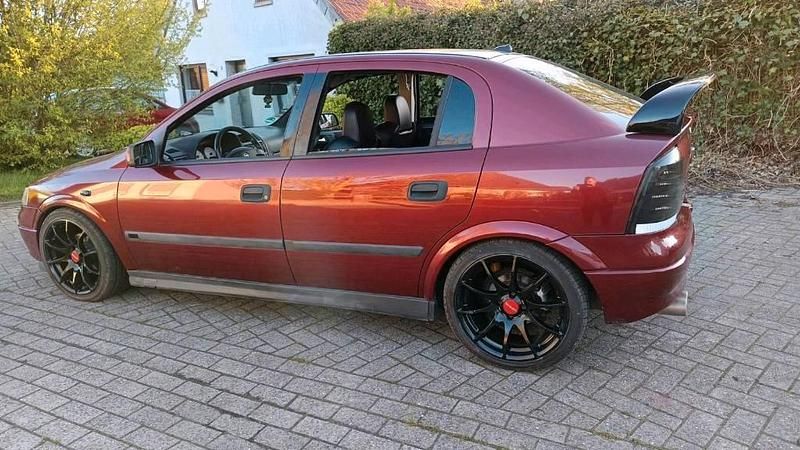 Second-hand Opel Astra 101 CP (74 kW) 2000 Roșu Hatchback