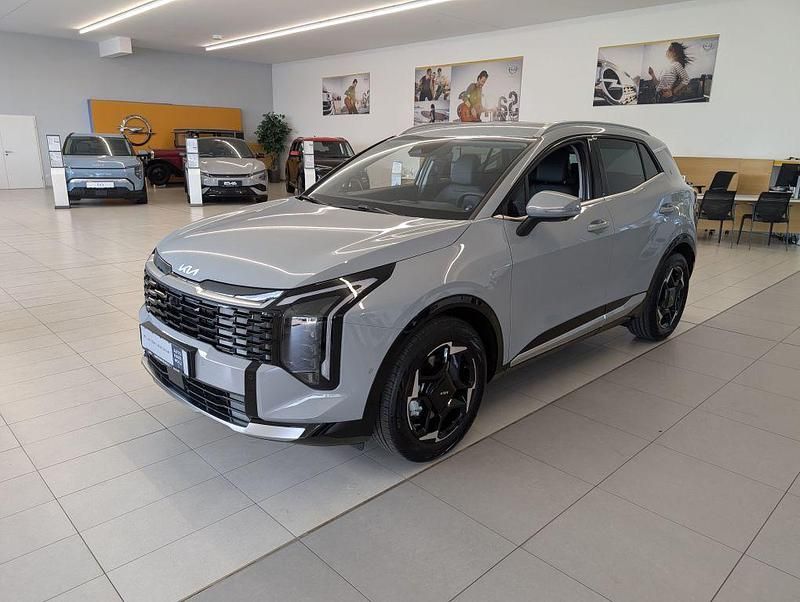 Wolfgrau Neu 2025 Kia Sportage Spirit SUV | 38.490 € (Teuer) - Bild 1/4