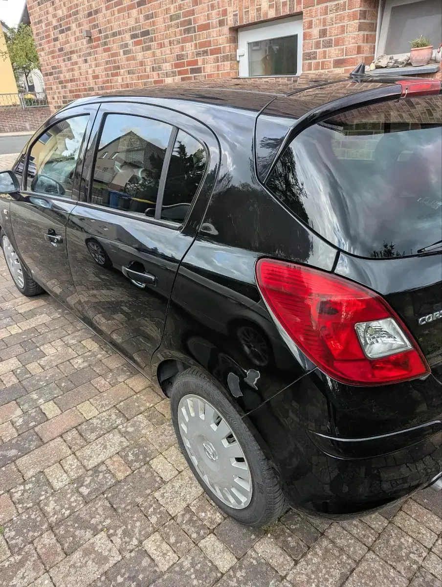 Gebraucht Opel Corsa 87 PS (63 kW) 2011 Schwarz Kleinwagen