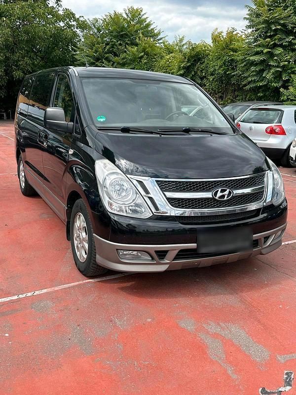 Schwarz Gebraucht 2010 Hyundai H-1 Van / Kleinbus | 6.999 € - Bild 1/4