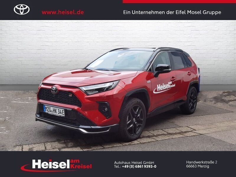 Karminarot metallic / dach schwarz Gebraucht 2023 Toyota RAV4 Hybrid Sport SUV | 54.960 € - Bild 1/4