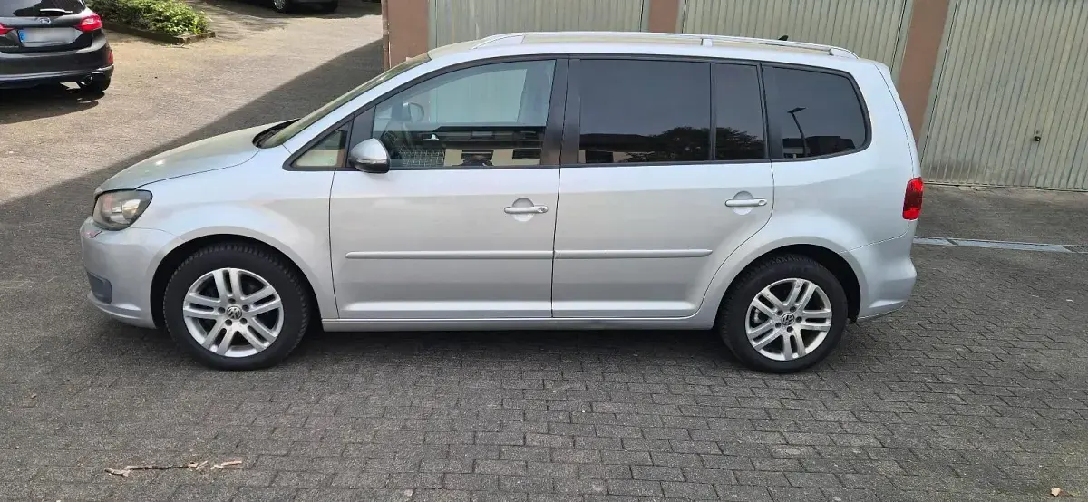 Gebraucht VW Touran 105 PS (77 kW) 2010 Silber Van / Kleinbus