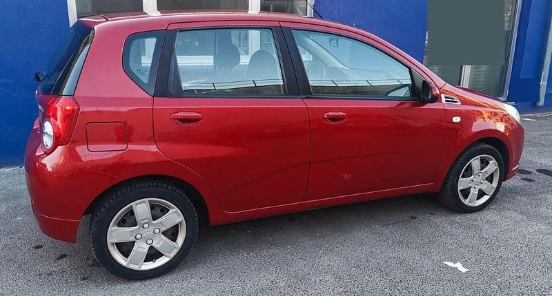 Gebraucht Chevrolet Aveo 84 PS (61 kW) 2011 Rot Limousine