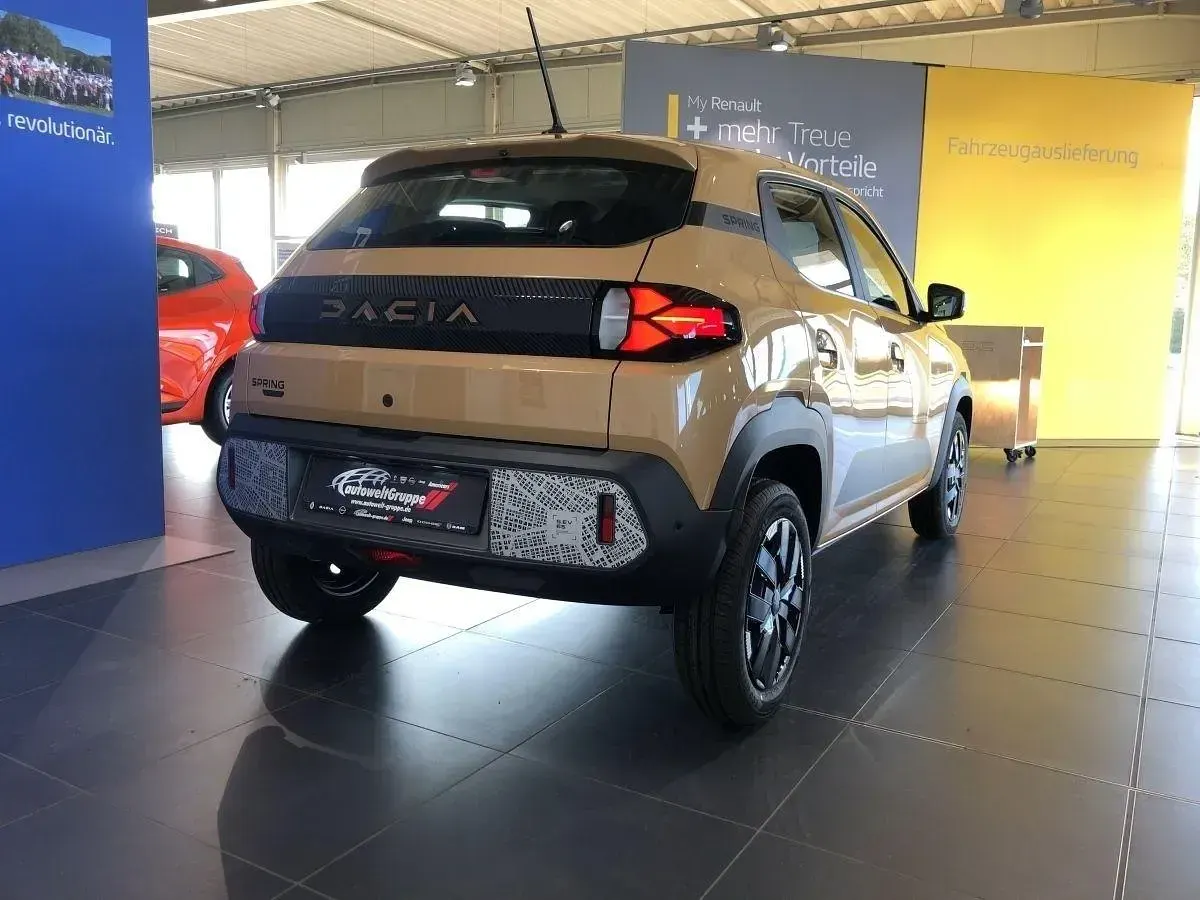 Gebraucht Dacia Spring Extreme 47 kW (65 PS) 2024 Beige Kleinwagen