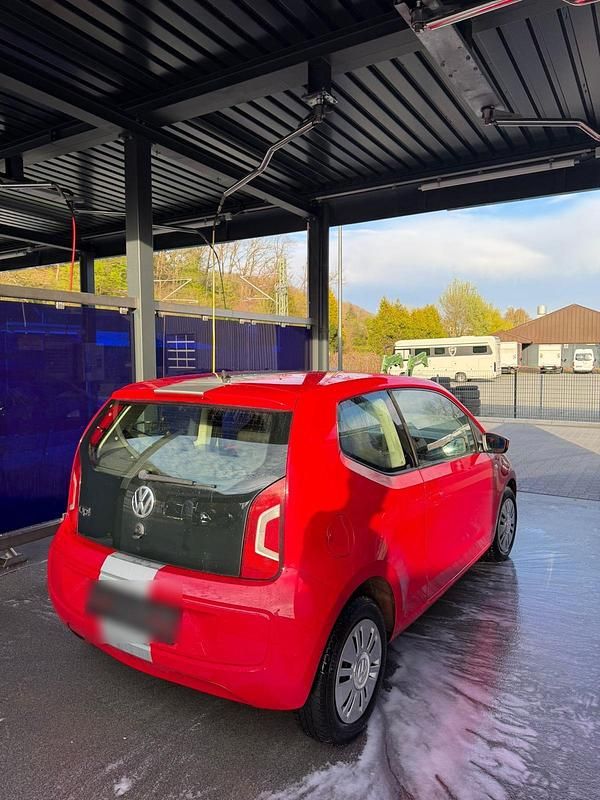 Usado VW up! 60 CV (44 kW) 2012 Rojo Utilitario