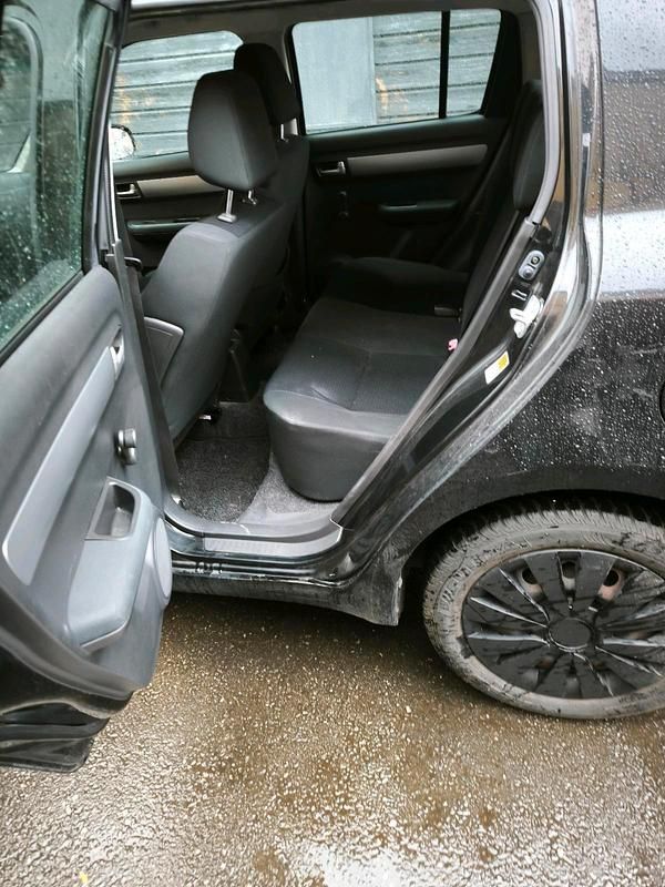 Second-hand Suzuki Swift 92 CP (67 kW) 2009 Negru Hatchback