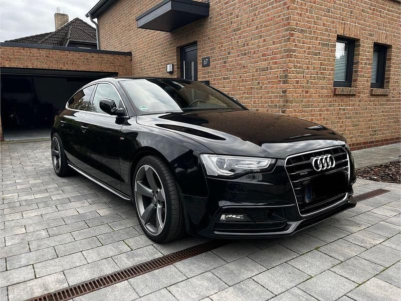 Schwarz Gebraucht 2013 Audi A5 Sportback Ambiente Limousine | 12.850 € (Fairer Preis) - Bild 1/4