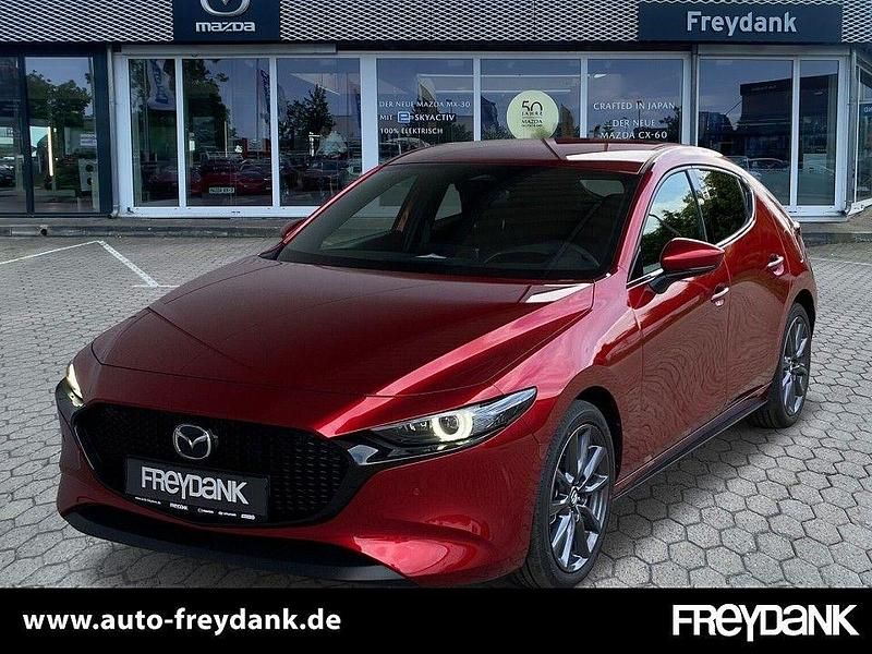 Soul red crystal m Gebraucht 2024 Mazda 3 Exclusive-Line | 26.990 € (Fairer Preis) - Bild 1/4