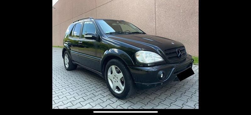 Schwarz Gebraucht 2003 Mercedes ML55 AMG AMG SUV | 3.250 € - Bild 1/4