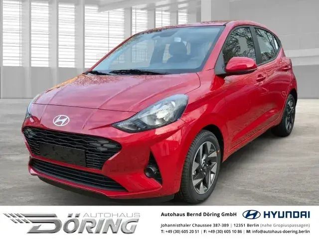 Dragon red / met Gebraucht 2024 Hyundai i10 Trend Kleinwagen | 18.450 € (Teuer) - Bild 1/4