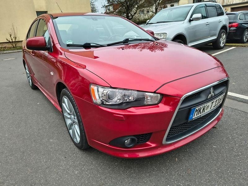 Gebraucht Mitsubishi Lancer 143 PS (105 kW) 2010 Rot Limousine