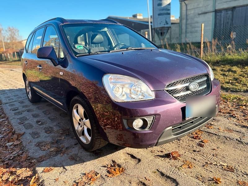 Violet Gebraucht 2009 Kia Carens Van / Kleinbus | 3.899 € (Fairer Preis) - Bild 1/4