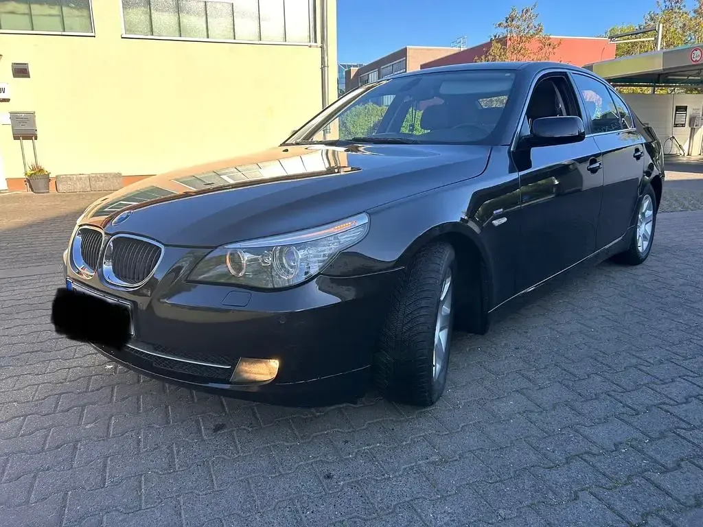 Second-hand BMW 520 163 CP (119 kW) 2009 Negru Berlinǎ