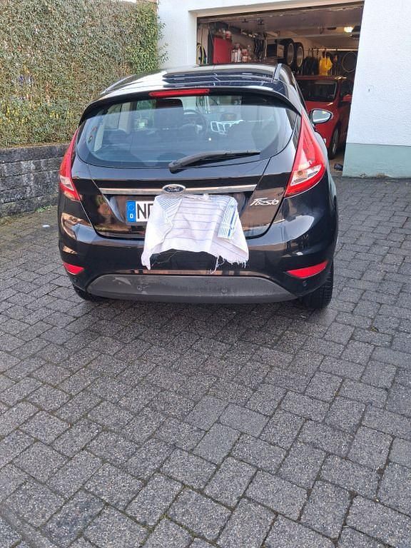Gebraucht Ford Fiesta Trend 82 PS (60 kW) 2011 Schwarz Kleinwagen