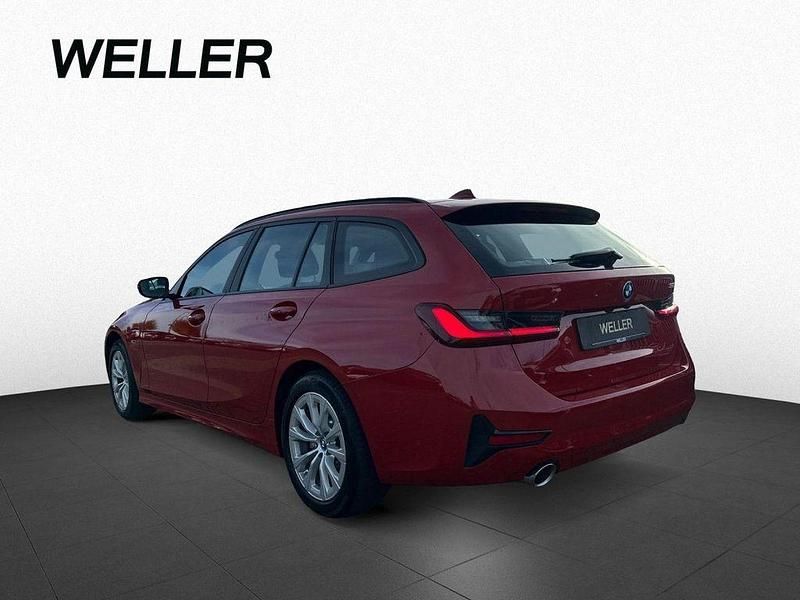 Gebraucht BMW 320e Advantage 204 PS (150 kW) 2021 Melbourne rot (rot) Kombi