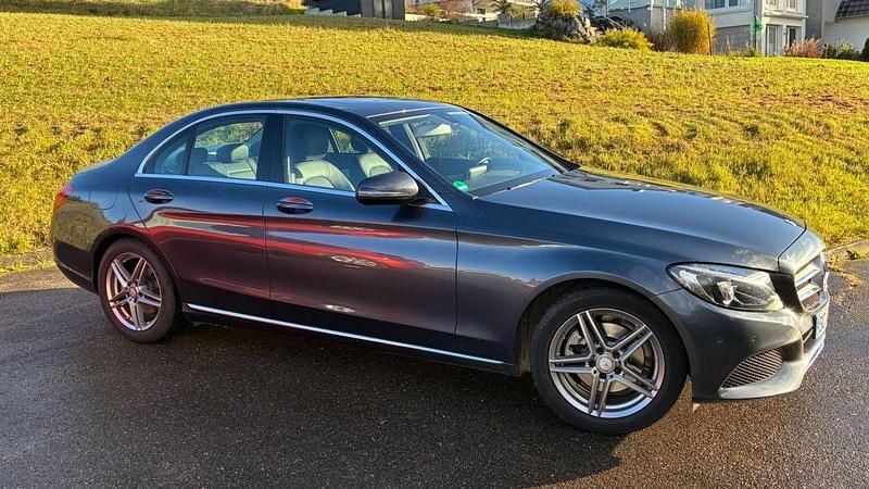 Grau Gebraucht 2015 Mercedes C200 Avantgarde Limousine | 15.600 € (Superpreis) - Bild 1/3