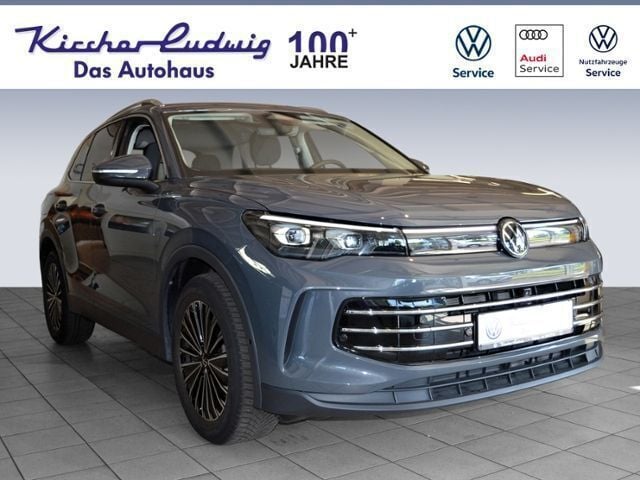 Delfingrau metallic (metallic) Gebraucht 2024 VW Tiguan Elegance SUV | 37.490 € (Fairer Preis) - Bild 1/4