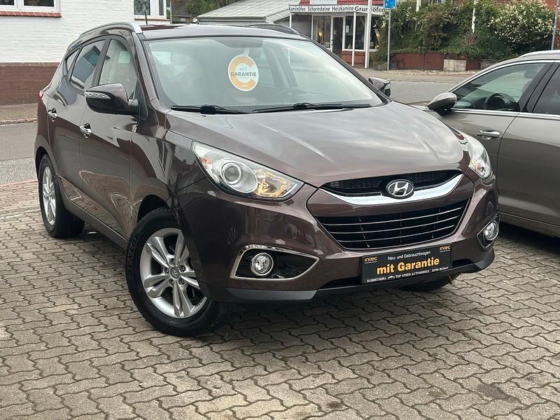 Braun Gebraucht 2012 Hyundai ix35 Premium SUV | 10.990 € (Fairer Preis) - Bild 1/4