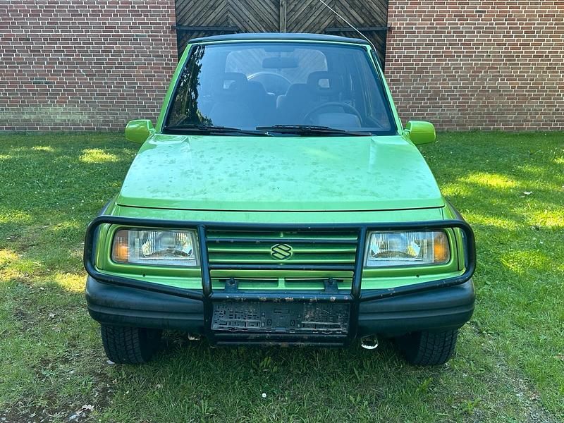 Grün Gebraucht 1990 Suzuki Vitara SUV | 2.600 € - Bild 1/4