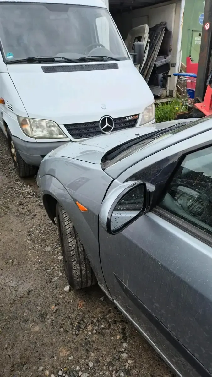 Używany Ford Focus 102 KM (75 kW) 2003 Szary Sedan/Limuzyna