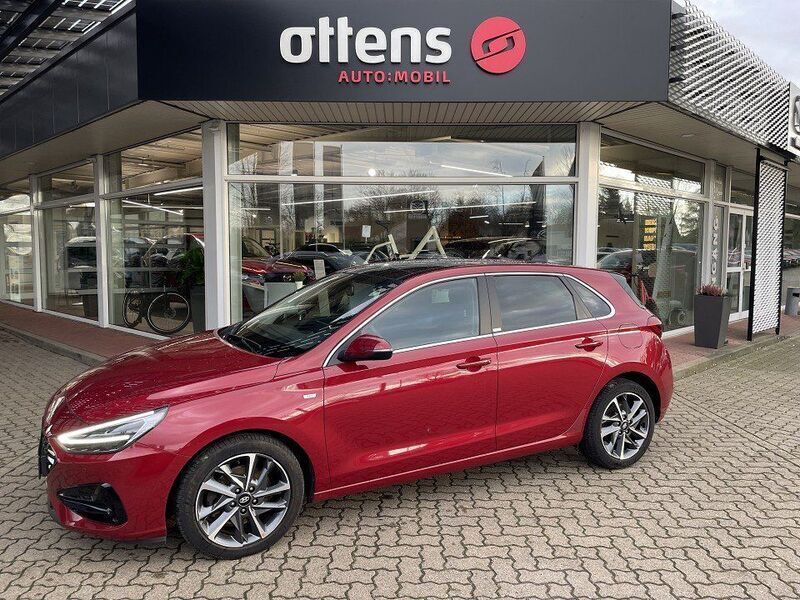 Rot Gebraucht 2021 Hyundai i30 Prime Limousine | 20.985 € (Fairer Preis) - Bild 1/4