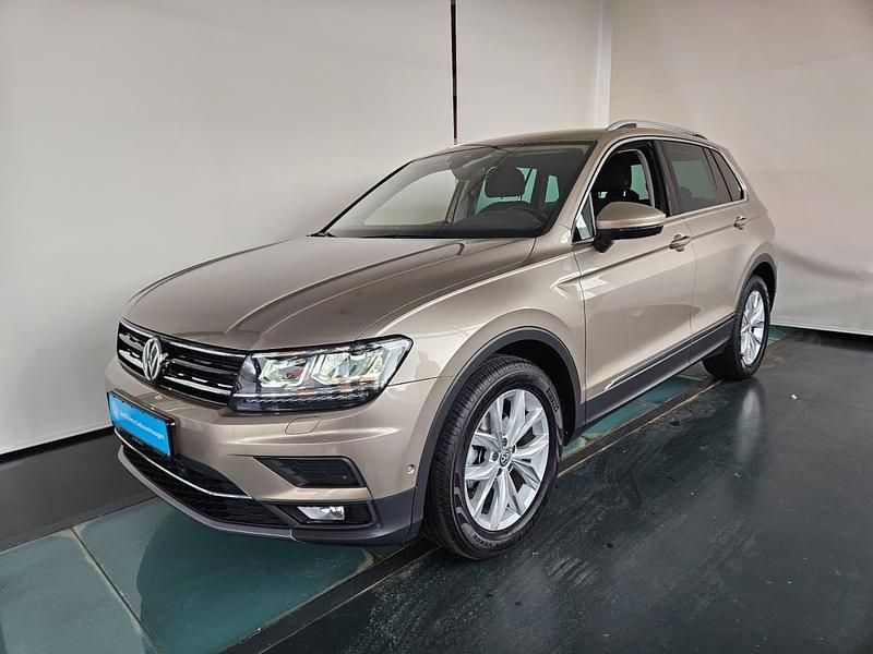 Titanium beige metallic Gebraucht 2019 VW Tiguan Highline SUV | 25.690 € (Fairer Preis) - Bild 1/4