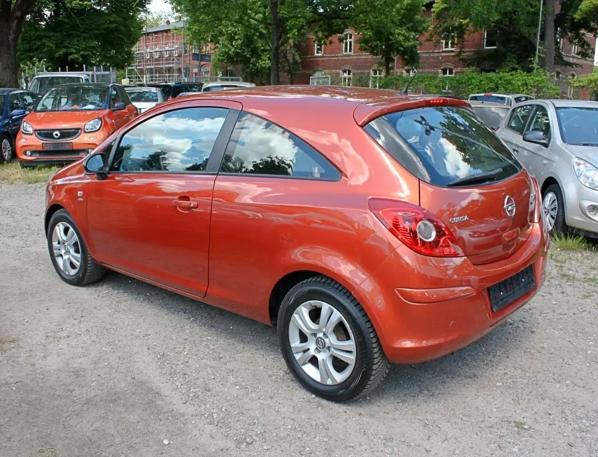 Gebraucht Opel Corsa Active 86 PS (63 kW) 2013 Orange Kleinwagen