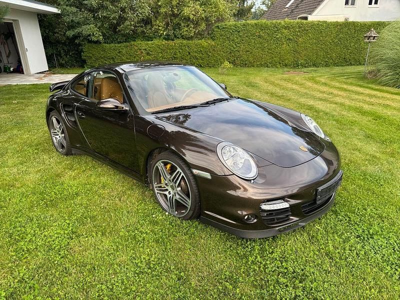 Braun Gebraucht 2007 Porsche 997 Turbo Coupé | 110.000 € - Bild 1/4