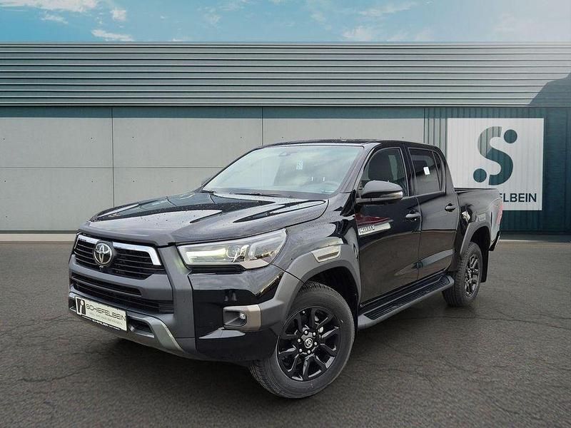 Tiefschwarz mica metallic Neu 2025 Toyota HiLux Abholung | 61.980 € (Teuer) - Bild 1/4
