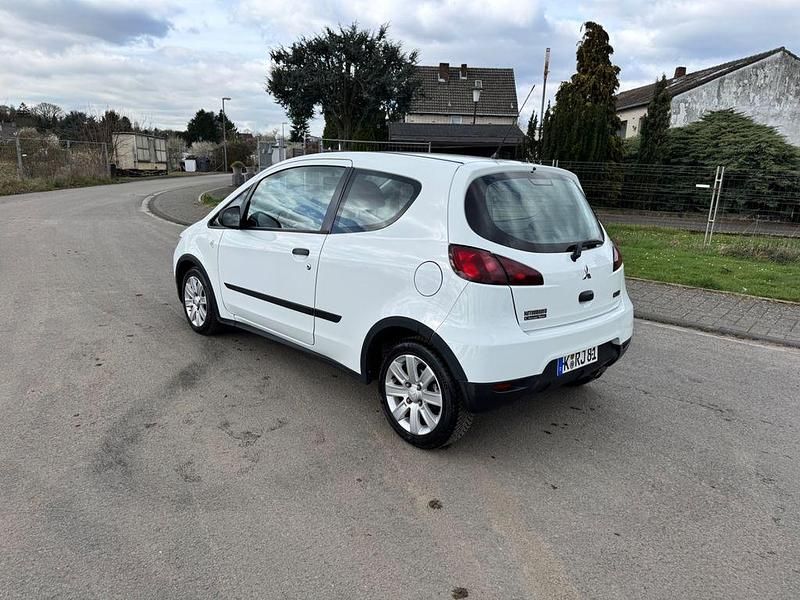 Gebraucht Mitsubishi Colt Edition 95 PS (69 kW) 2011 Weiß Kleinwagen