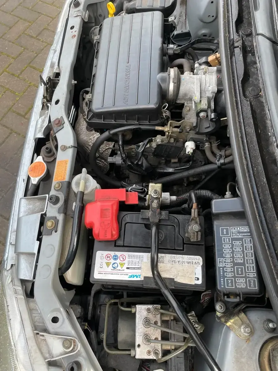 Gebraucht Daihatsu Cuore 58 PS (42 kW) 2006 Silber Kleinwagen