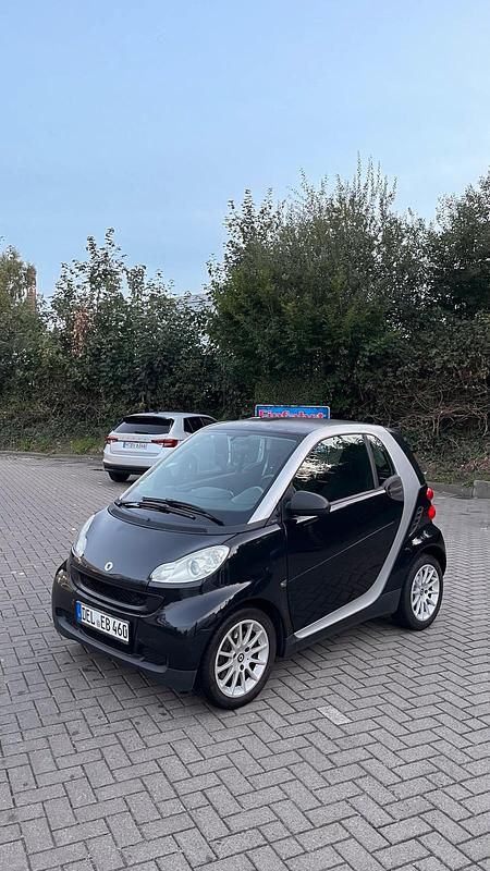Schwarz Gebraucht 2009 Smart ForTwo Coupé Passion Coupé | 3.900 € (Fairer Preis) - Bild 1/4