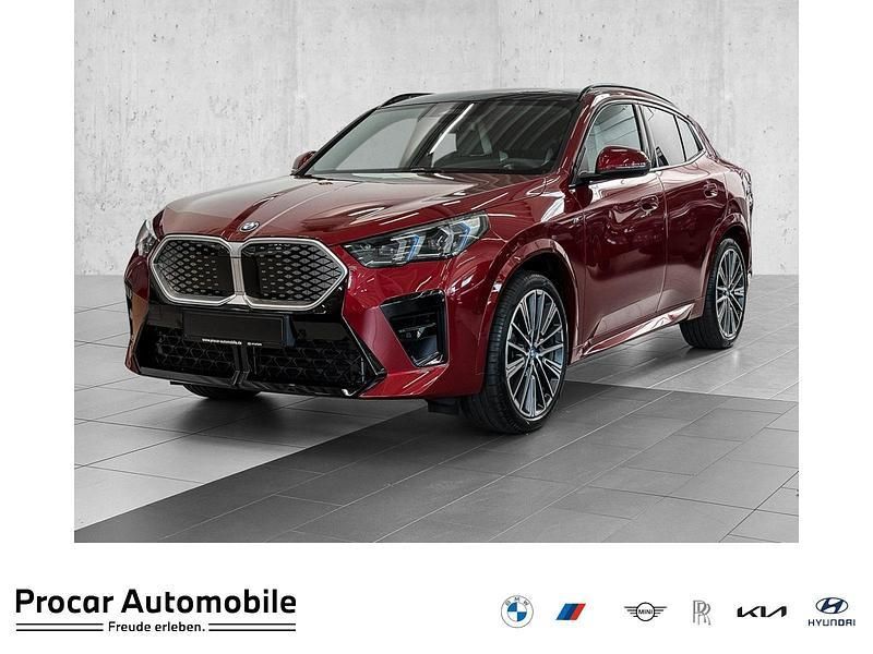 Fire red metallic Neu 2025 BMW iX2 M Sport SUV | 58.790 € (Fairer Preis) - Bild 1/2