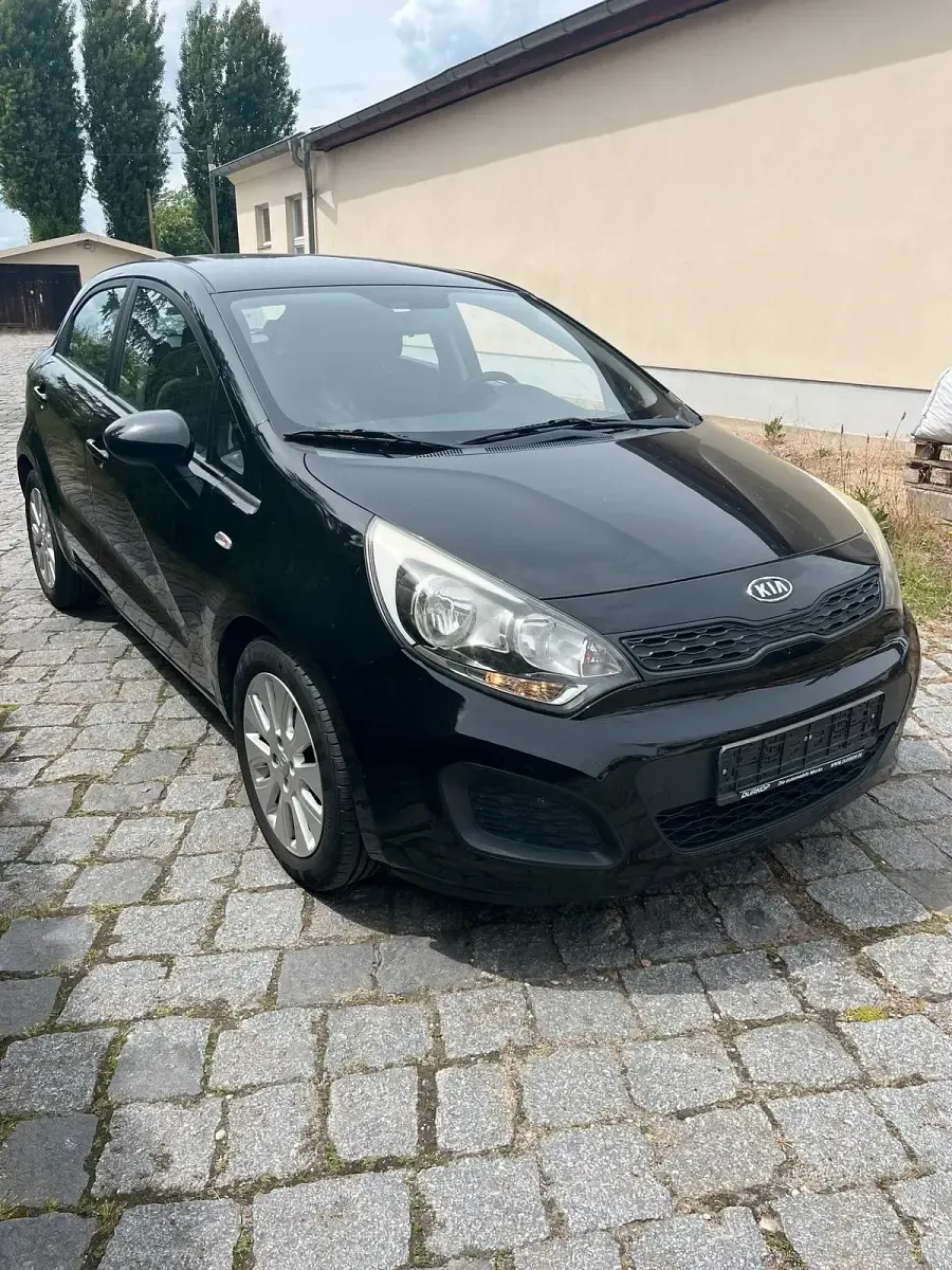 Gebraucht Kia Rio 86 PS (63 kW) 2011 Schwarz Kleinwagen