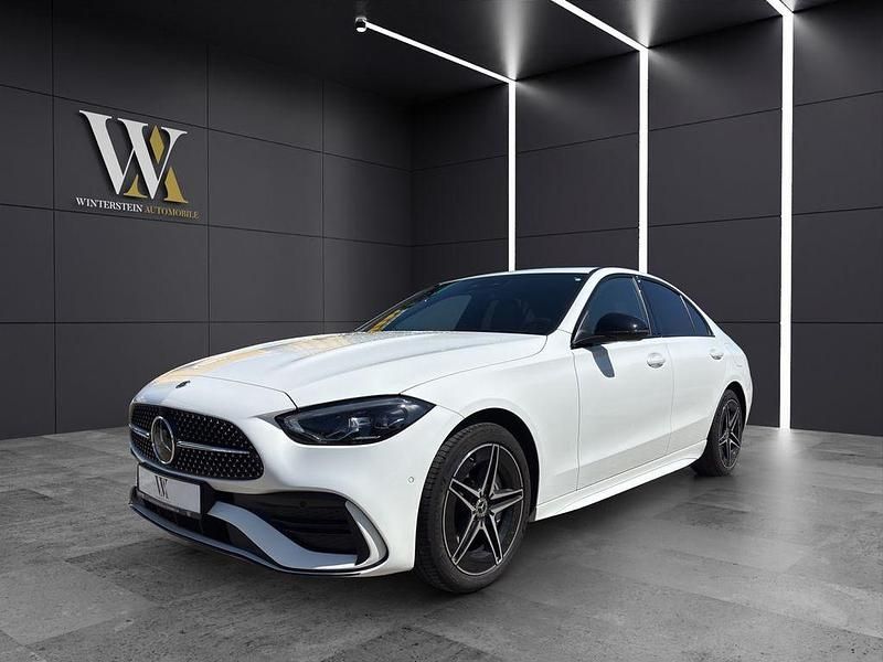 Weiß Gebraucht 2022 Mercedes C300e AMG Limousine | 37.900 € (Teuer) - Bild 1/4
