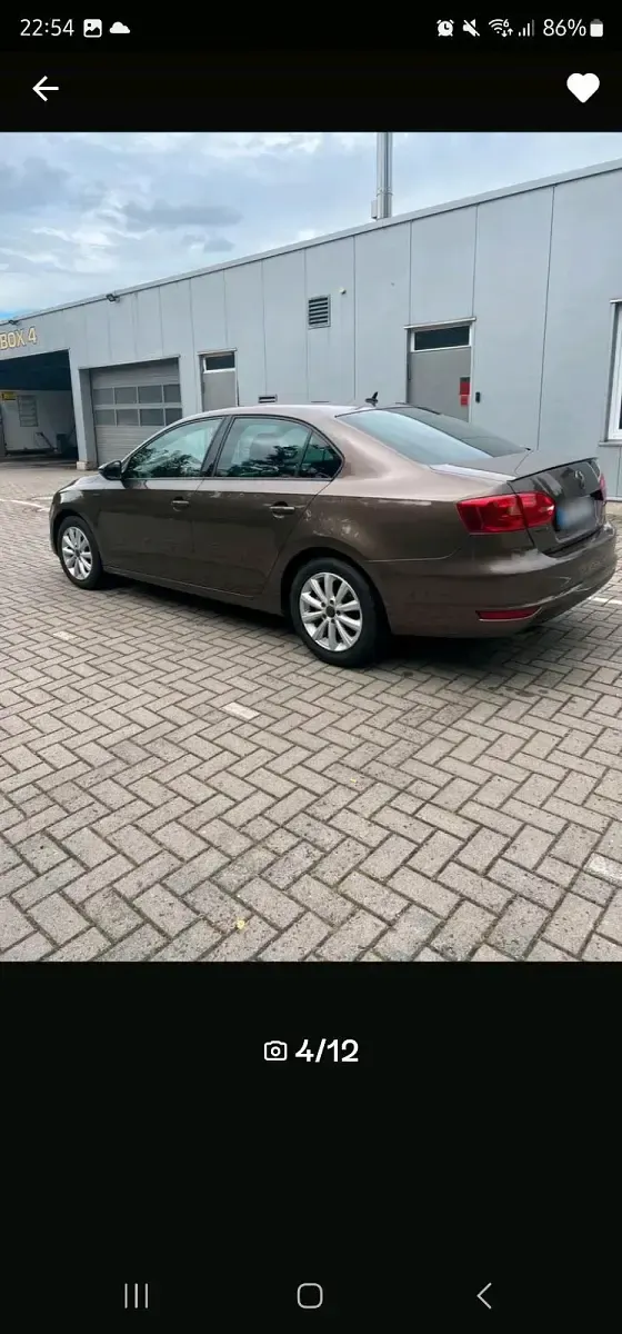 Używany VW Jetta Life 122 KM (89 kW) 2014 Brązowy Sedan/Limuzyna