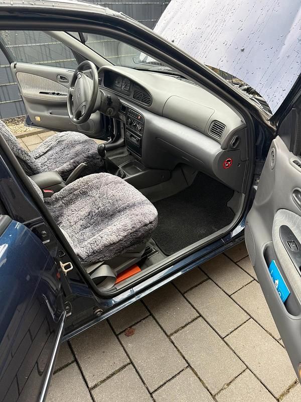 Gebraucht Kia Sephia 80 PS (58 kW) 1996 Blau Limousine