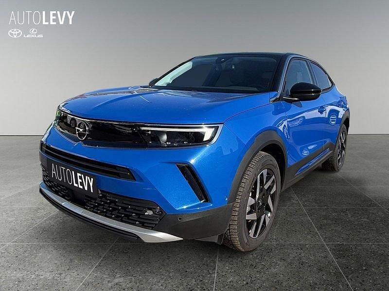 Gebraucht Opel Mokka-e Elegance 100 kW (136 PS) 2023 Voltaic blue met/typ aussenverkleidung m (metallic) SUV