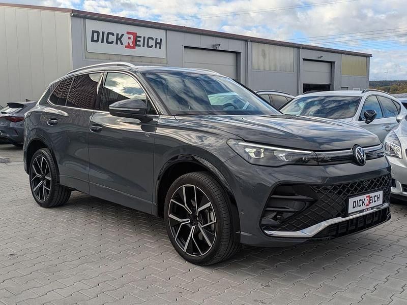 Delfingrau metallic Gebraucht 2025 VW Tiguan R-line SUV | 46.950 € (Fairer Preis) - Bild 1/3