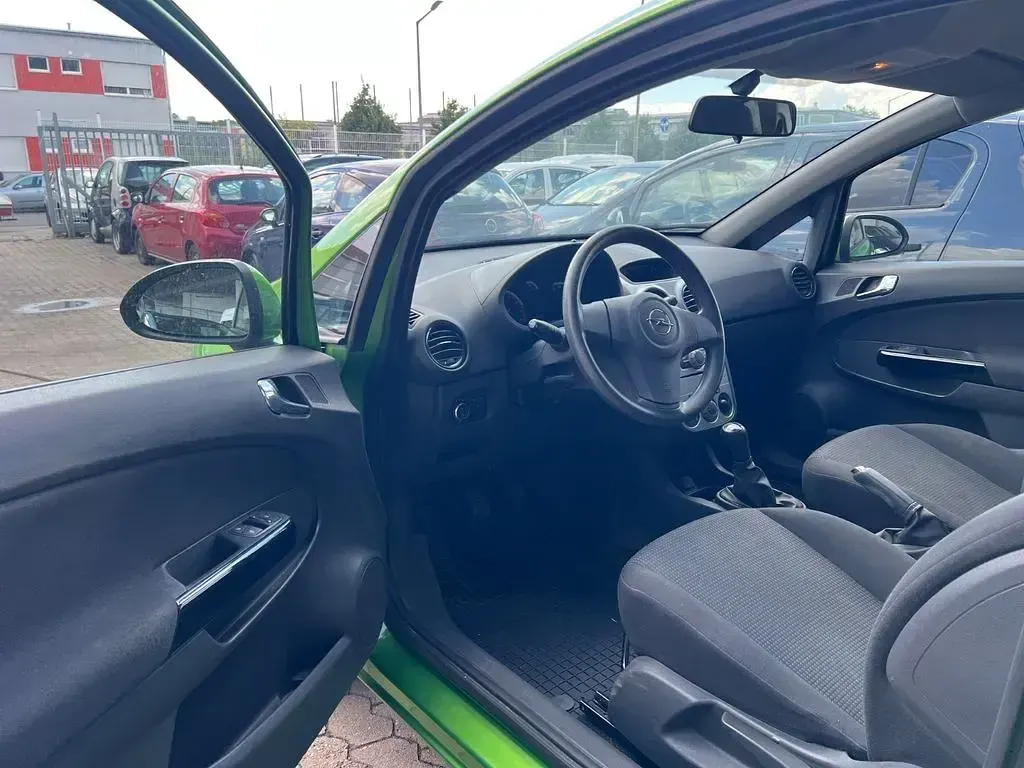 Gebraucht Opel Corsa 69 PS (50 kW) 2013 Grün Kleinwagen