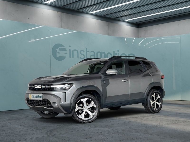 Grau Neu 2025 Dacia Duster Journey SUV | 28.970 € (Teuer) - Bild 1/4