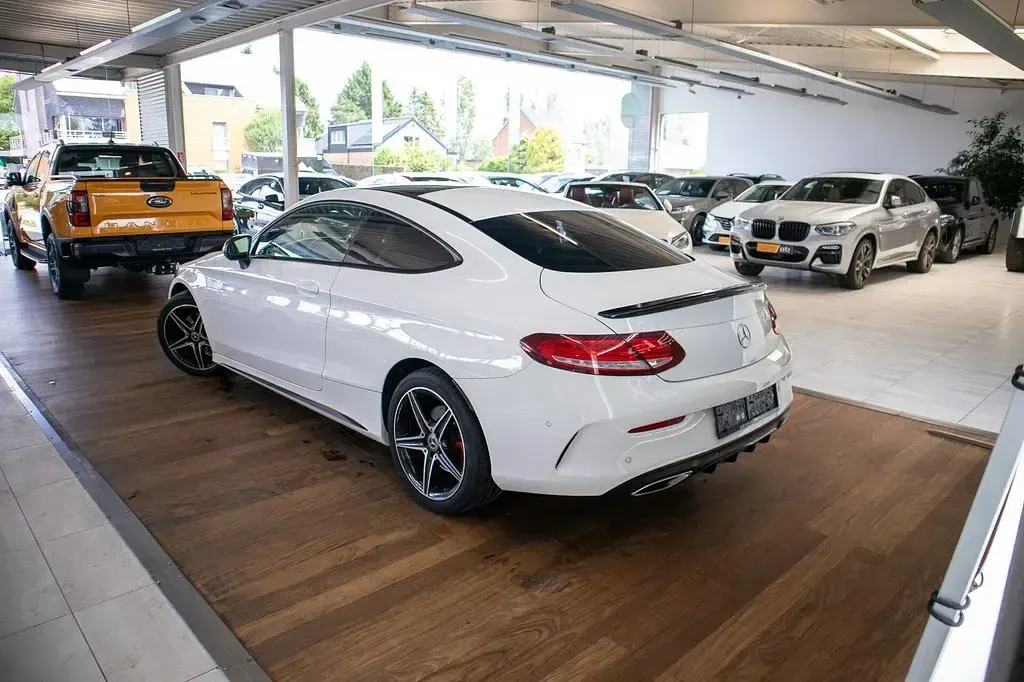 Gebraucht Mercedes C180 AMG line 156 PS (114 kW) 2017 Weiß Coupé