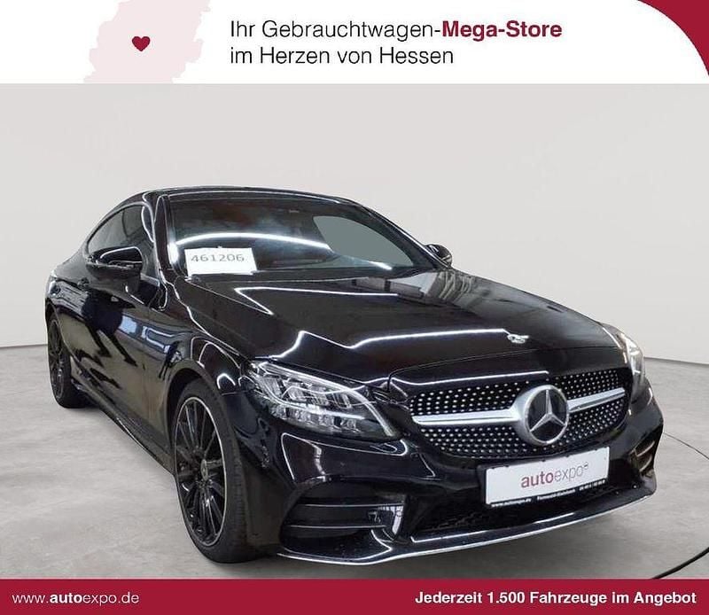 Obsidianschwarz metallic Gebraucht 2021 Mercedes C220 AMG line Coupé | 34.990 € (Fairer Preis) - Bild 1/4
