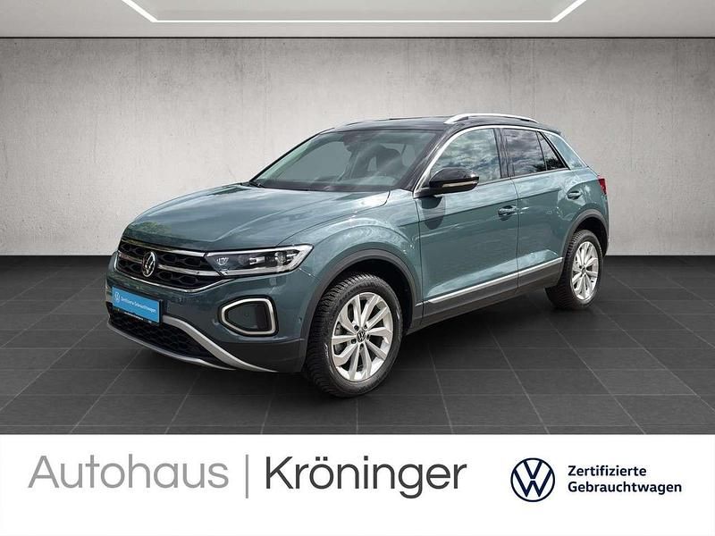 Petroleum blue metallic Gebraucht 2024 VW T-Roc Style SUV | 29.990 € (Fairer Preis) - Bild 1/3