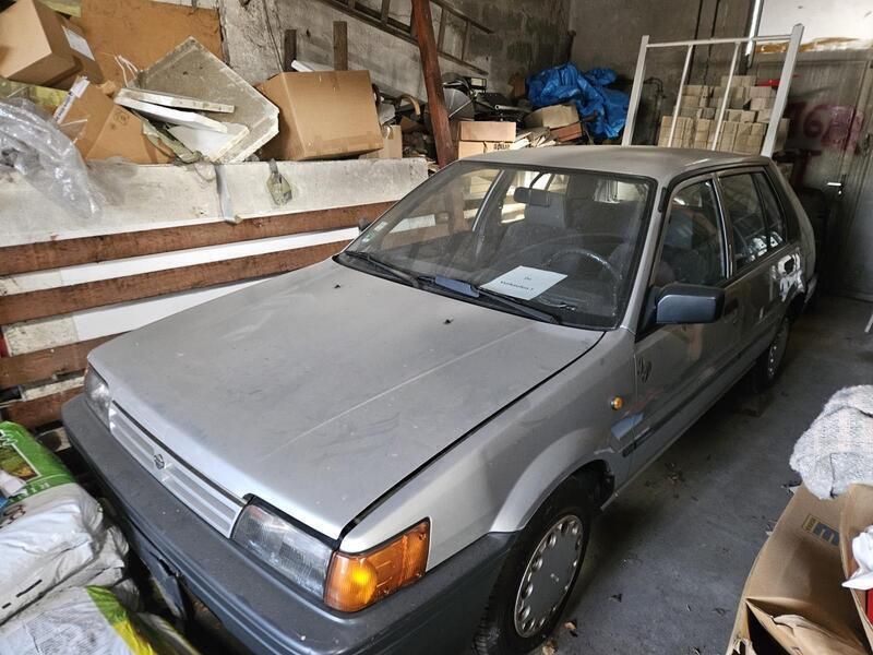 Grau Gebraucht 1989 Nissan Sunny Limousine | 1.950 € - Bild 1/4