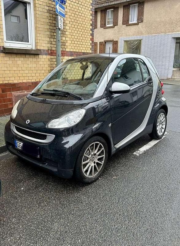 Schwarz Gebraucht 2009 Smart ForTwo Coupé Passion Coupé | 4.590 € (Fairer Preis) - Bild 1/4